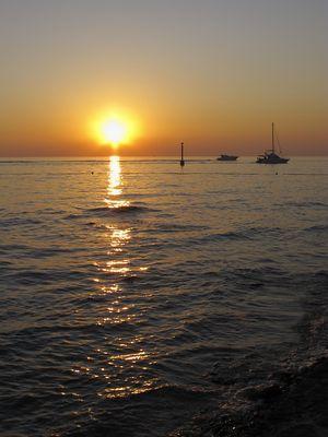 Serie: Sonnenuntergang mit Booten